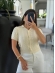 CROPPED POLO TRANÇAS - OFF WHITE